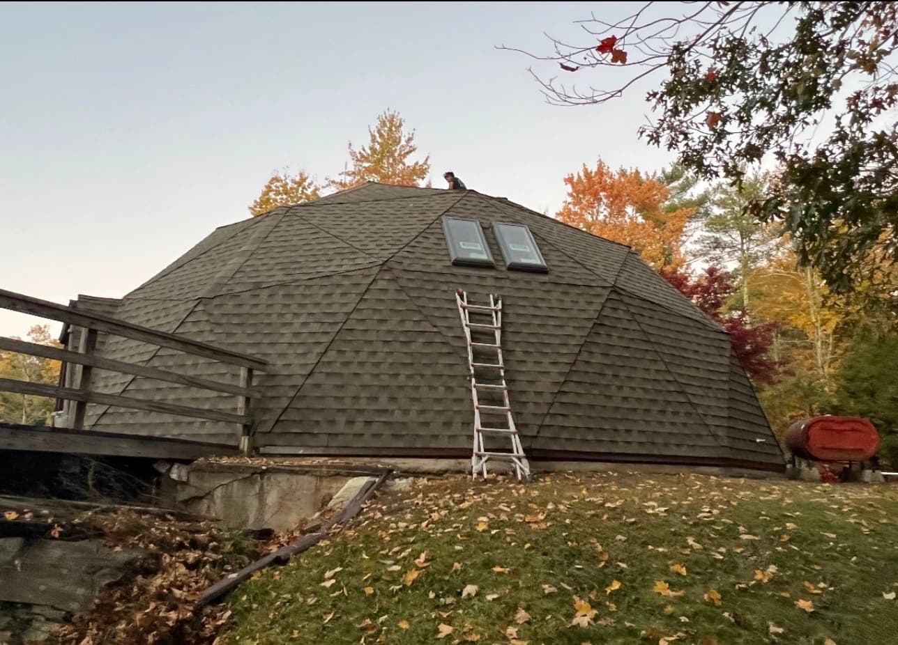 Skylight installation integrated with architectural shingle roof